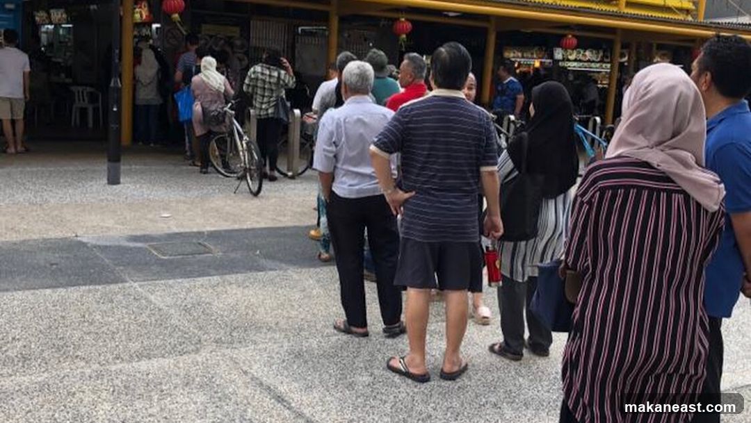 People queuing outside a food establishment