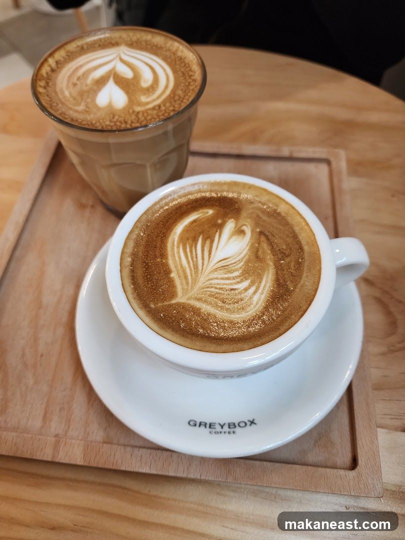 Two coffees with latte art