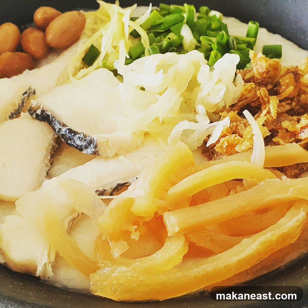 Congee with fish and toppings