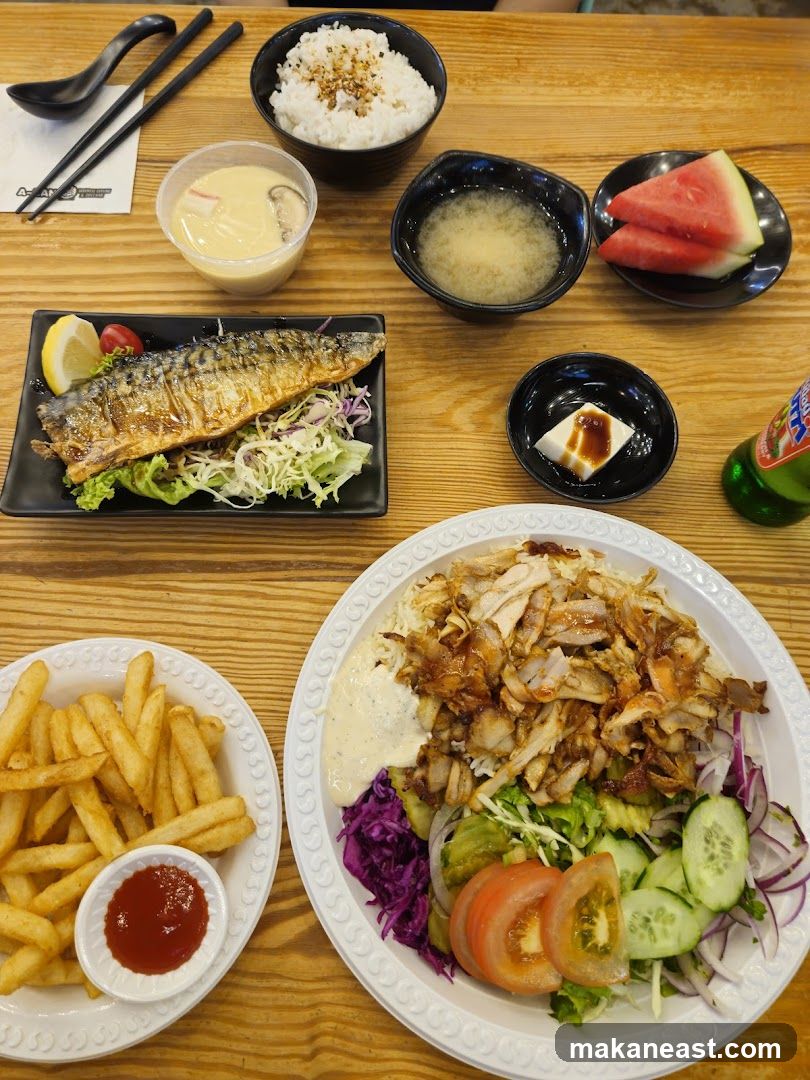 Table with Japanese and Middle Eastern Food