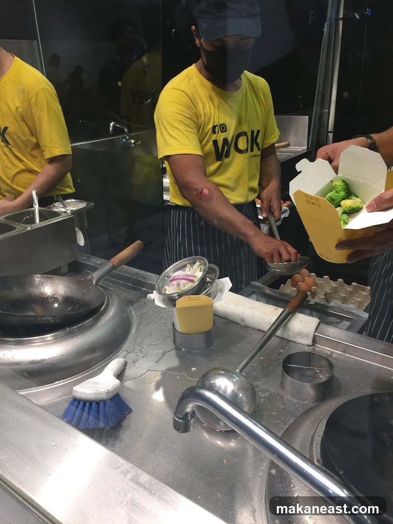 Wok Kitchen Staff Preparing Food
