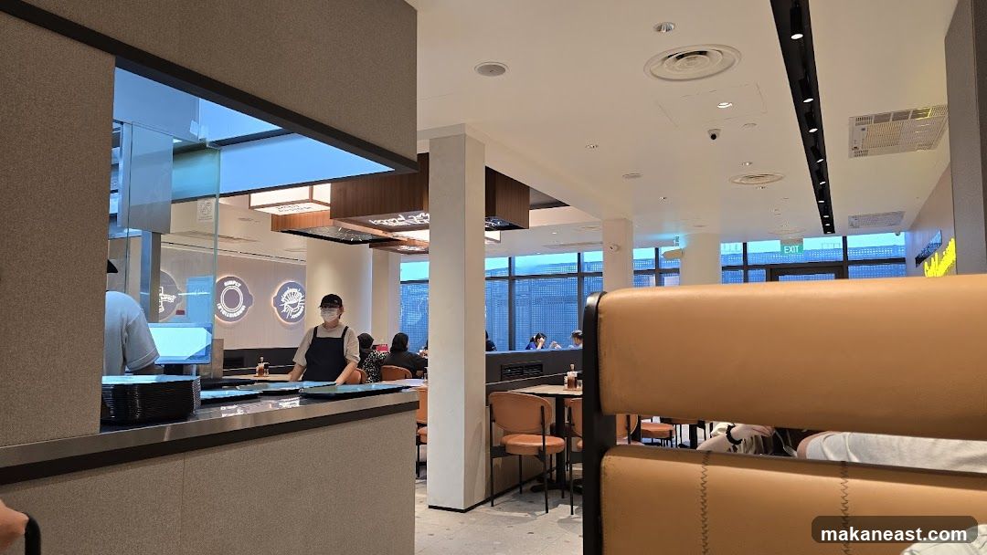 Restaurant Interior with Staff and Diners