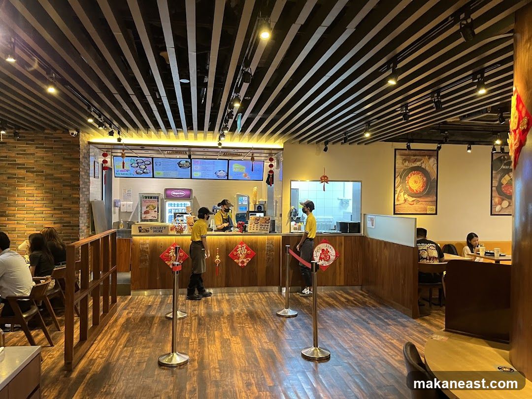 Restaurant Interior with Staff and Customers