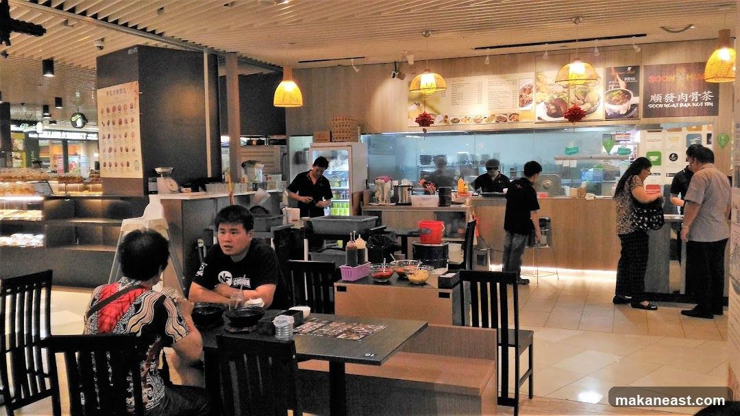 Restaurant Interior with Diners and Staff