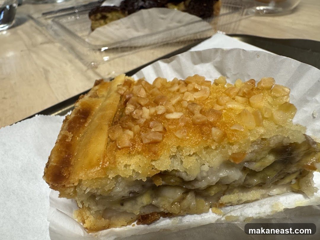 Slice of pastry with nuts