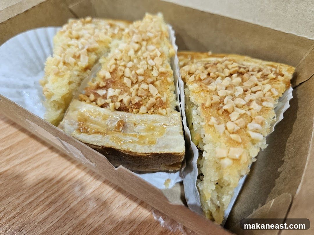 Two Slices of Nut-Topped Pastry