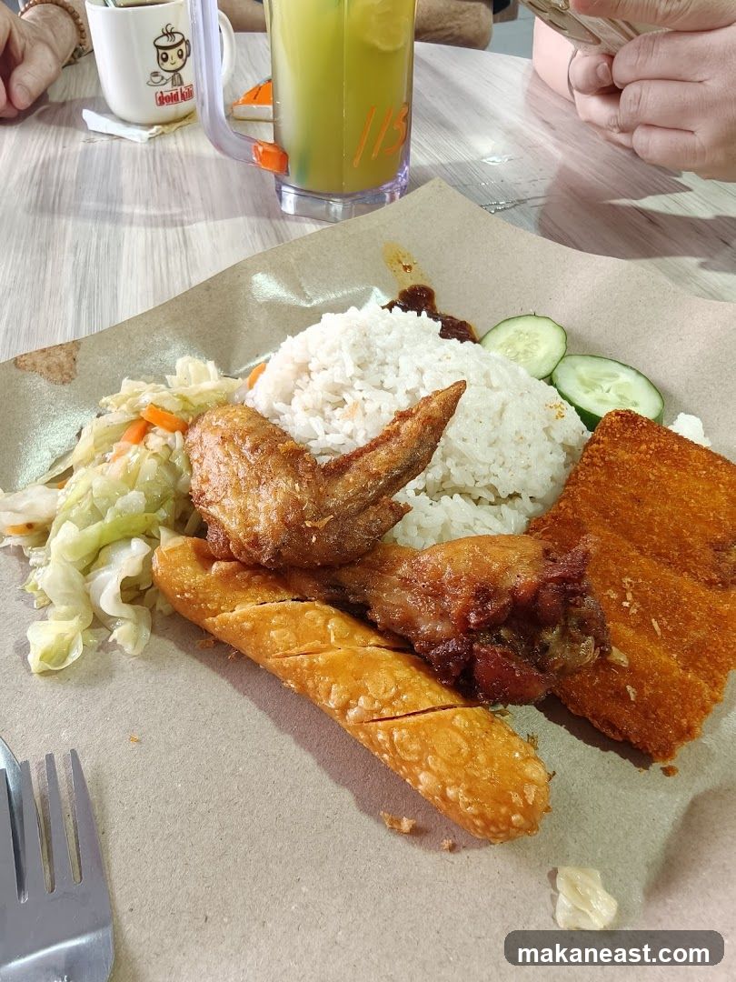 Fried Chicken and Sausage Rice Plate