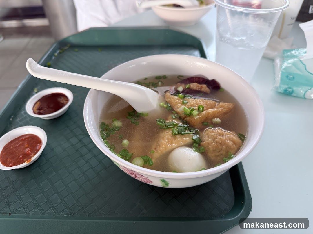 Bowl of Soup with Fish Balls and Tofu