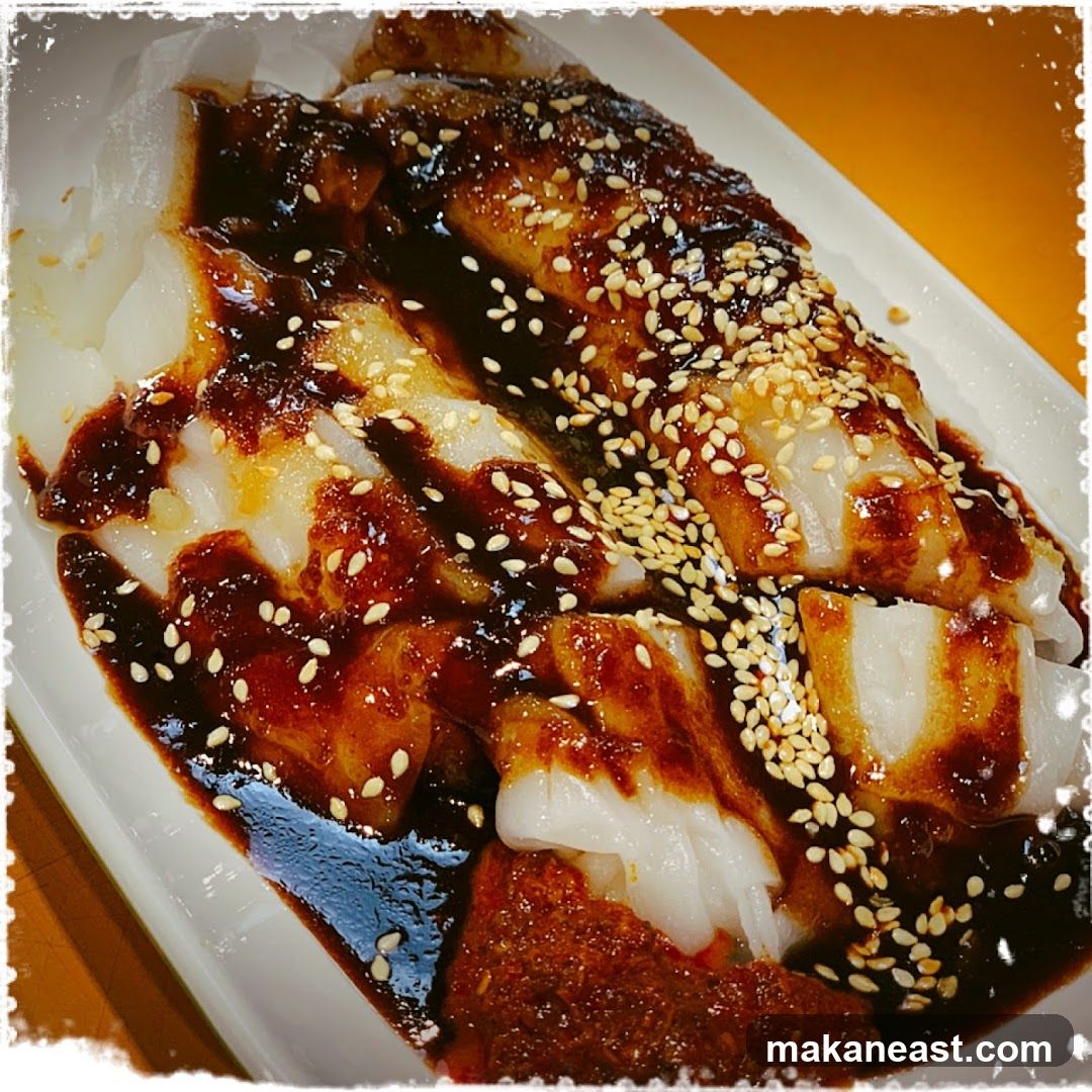 Cheung Fun with Sauce and Sesame Seeds