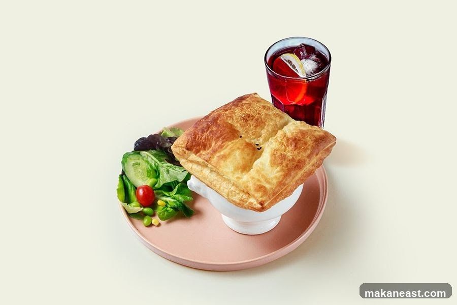 Savory Pastry with Salad and Drink