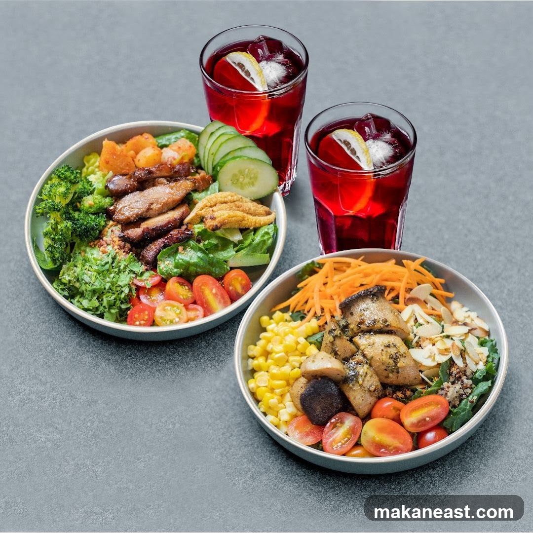 Two healthy salads with drinks