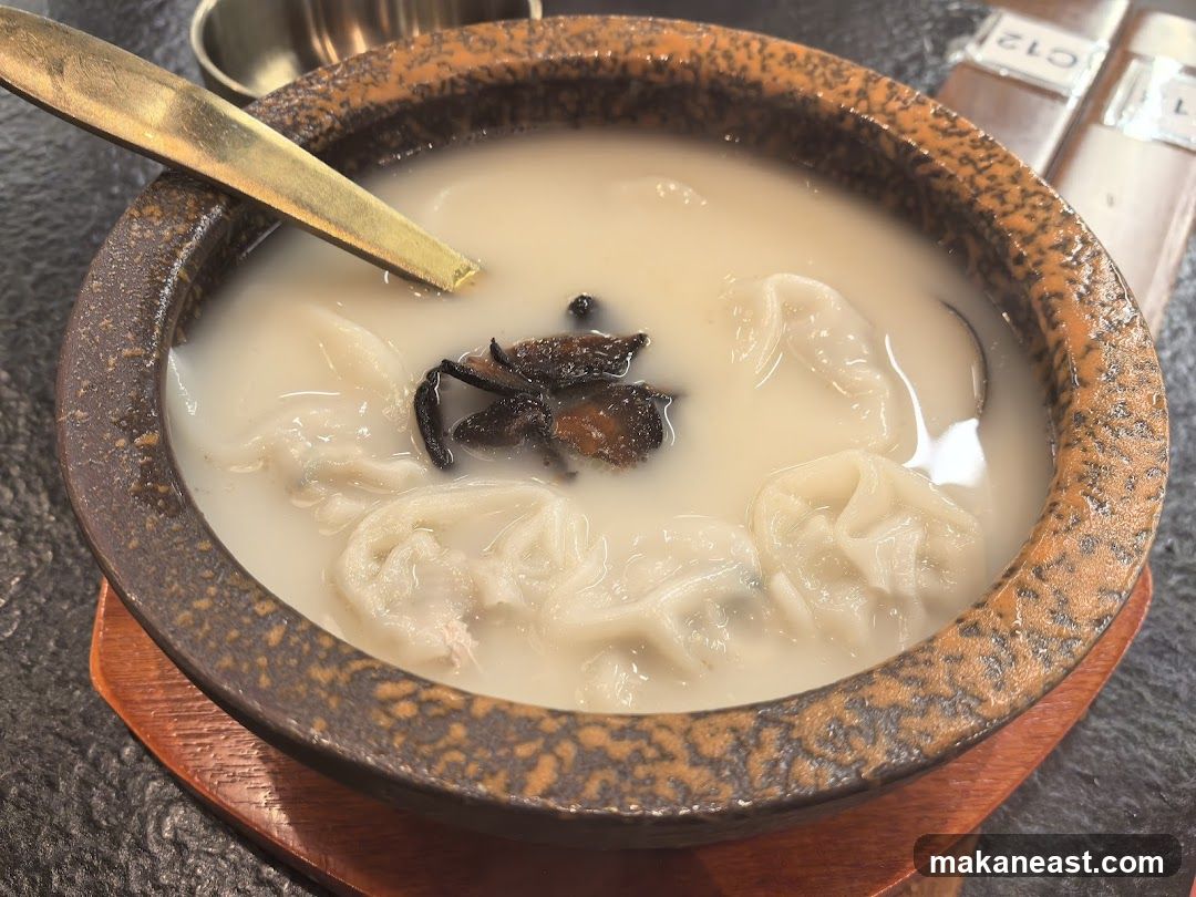 Bowl of Soup with Dumplings
