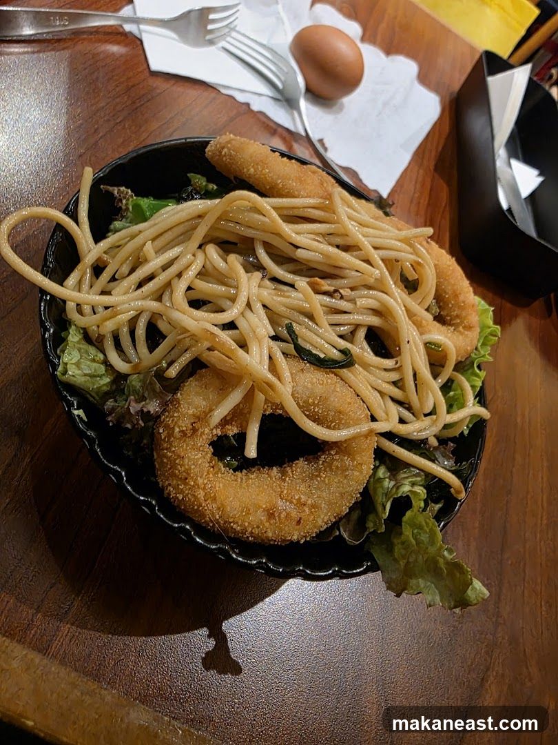 Spaghetti with Fried Rings and Salad