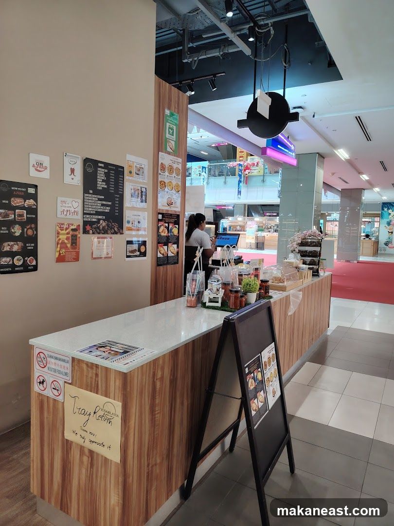 Food stall counter with menu and signage