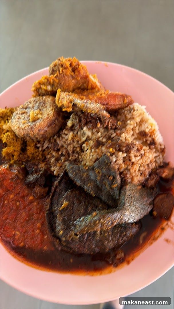 Plate of Rice with Various Toppings