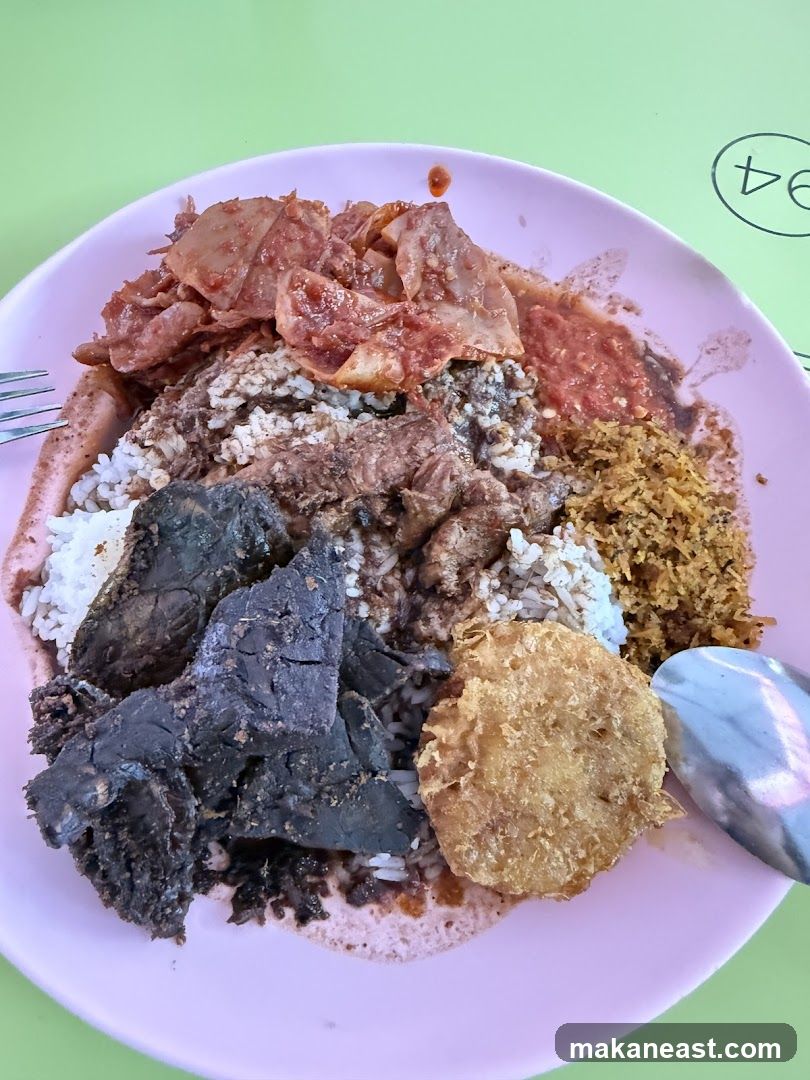 Plate of Rice with Various Toppings