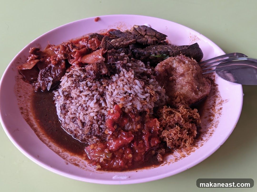 Plate of Rice with Various Toppings