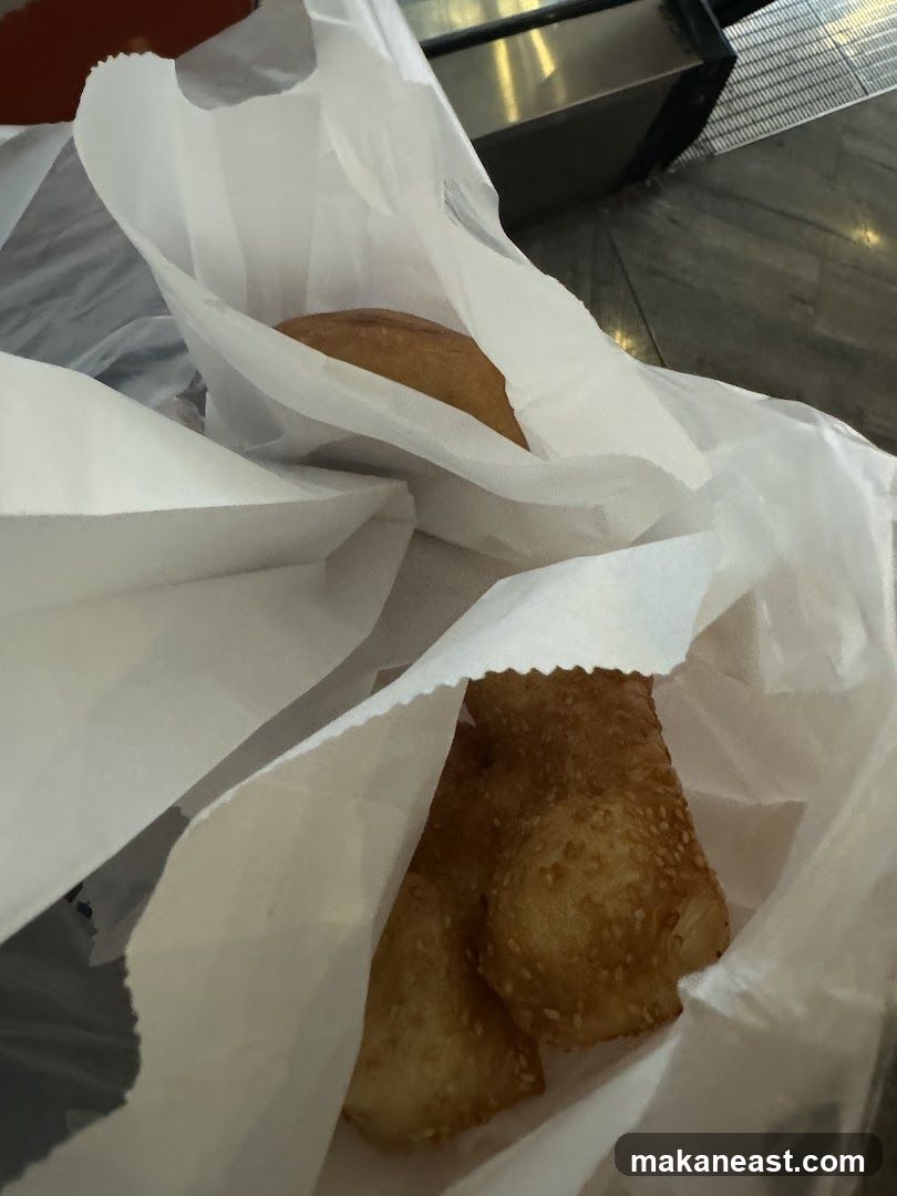 Fried Pastries in Paper Bags