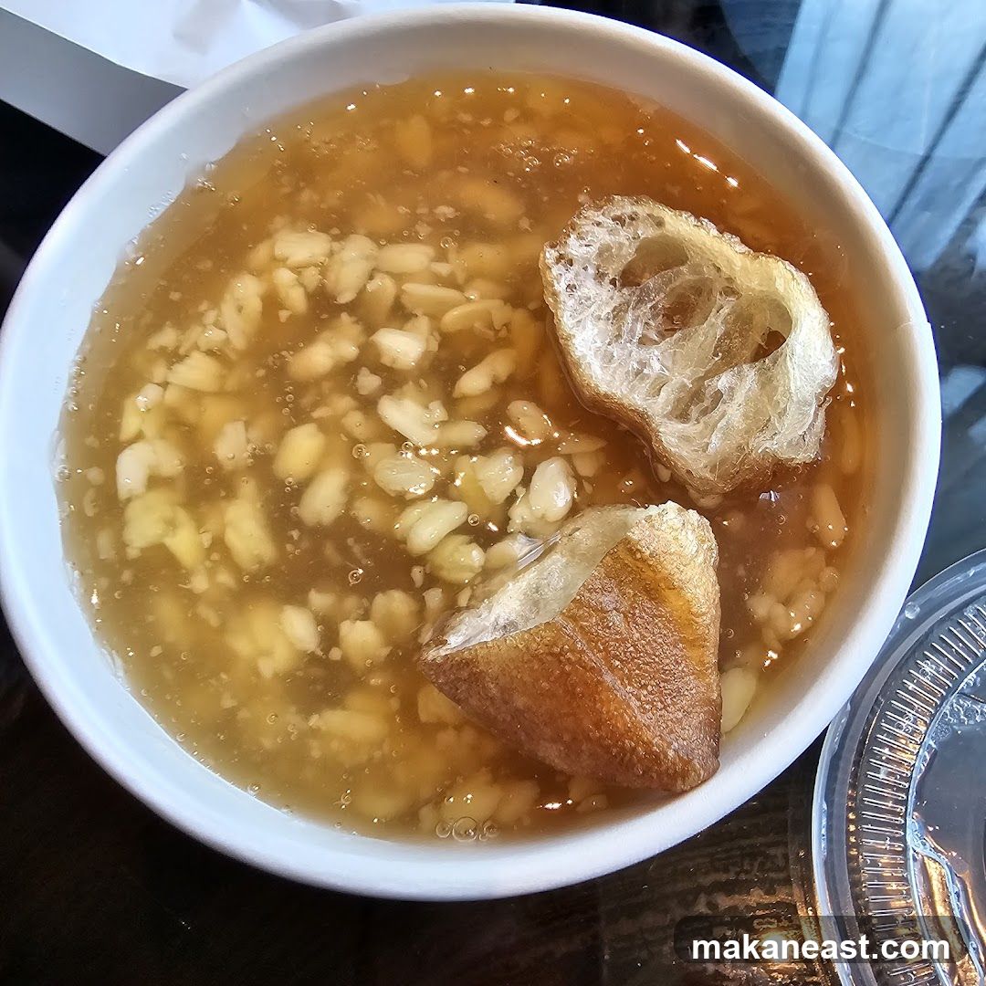 Bowl of Sweet Soup with Fried Dough