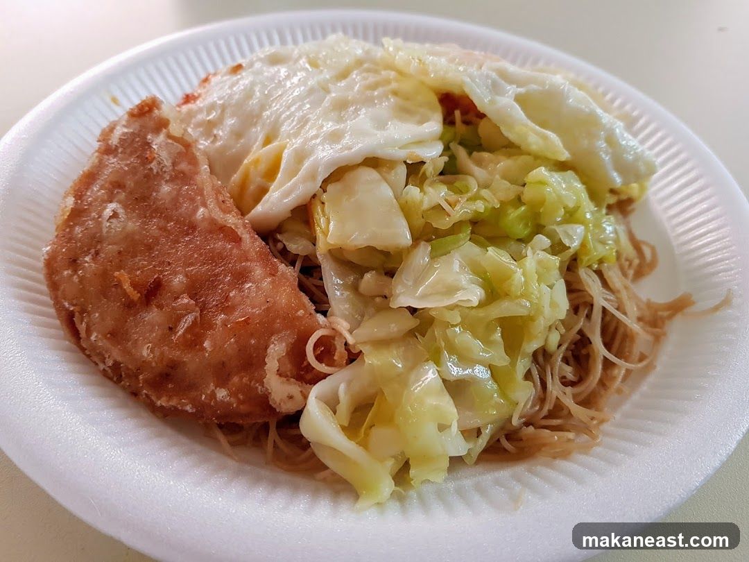 Fried Pork Chop with Noodles and Cabbage