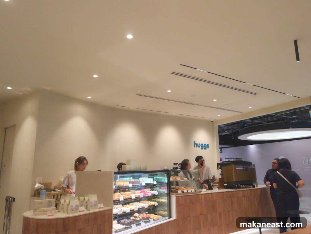 Cafe Interior with Desserts and Coffee Machine