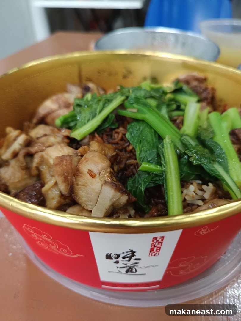 Bowl of food with meat and vegetables