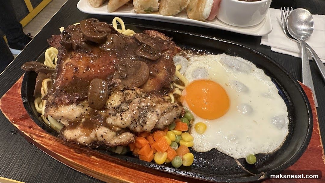 Sizzling Chicken Steak with Noodles and Egg