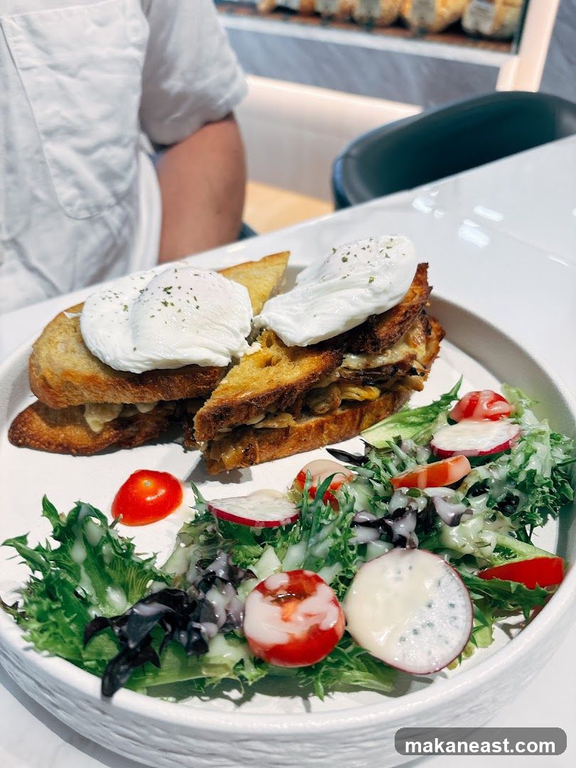 Sandwich with Poached Eggs and Salad
