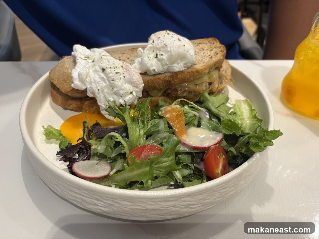 Sandwich with Poached Eggs and Salad