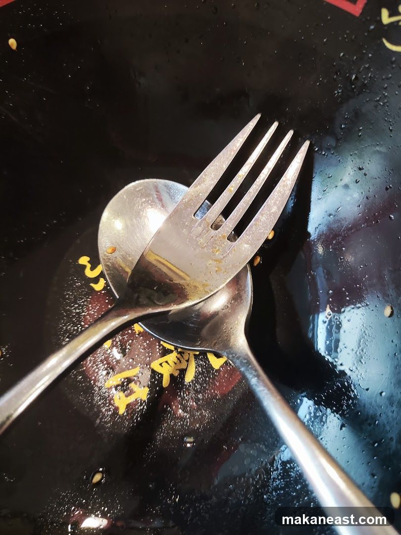 Used Utensils in a Bowl