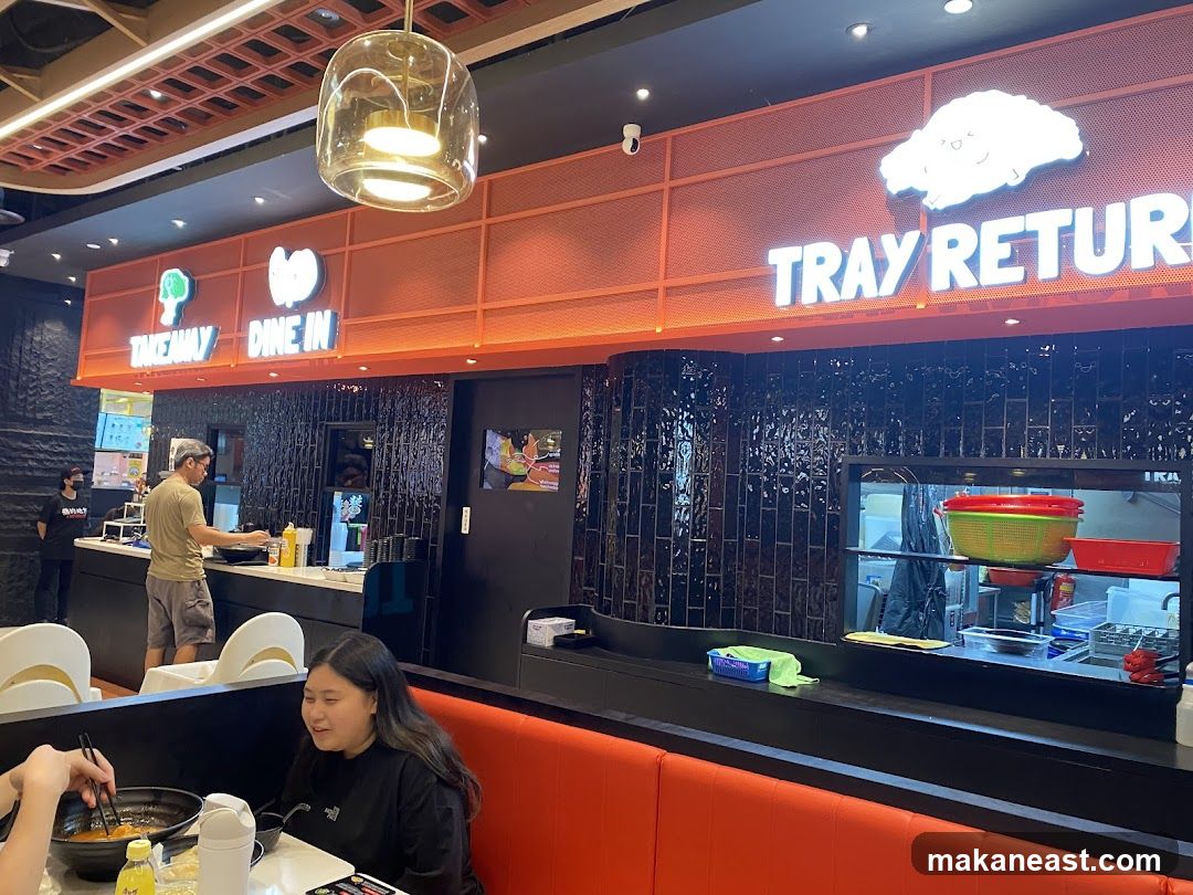 Restaurant Interior with Takeaway and Dine-In Signs