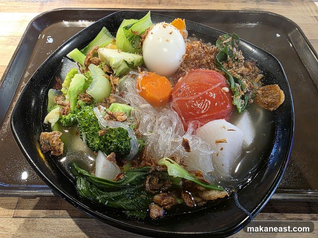 Bowl of Soup with Vegetables and Egg