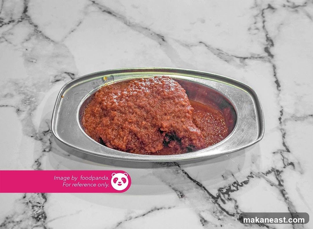 Spicy Red Sauce in a Metal Bowl