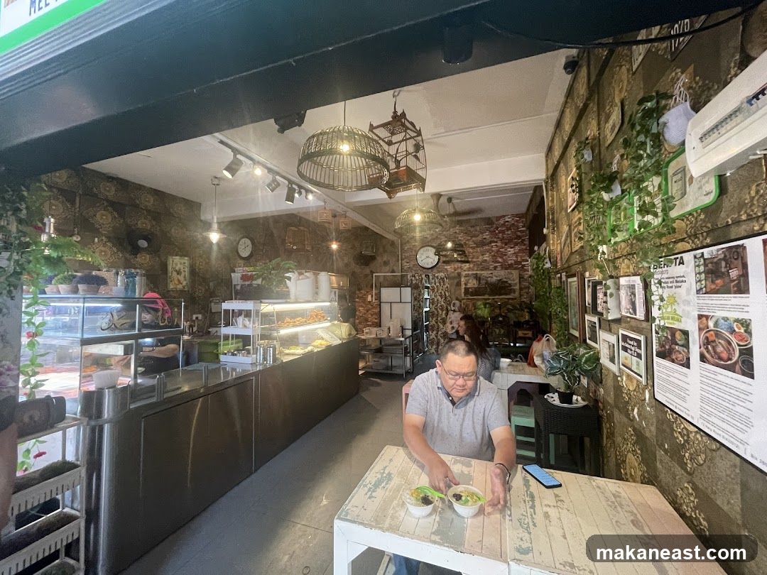 Interior of a cafe with food displays