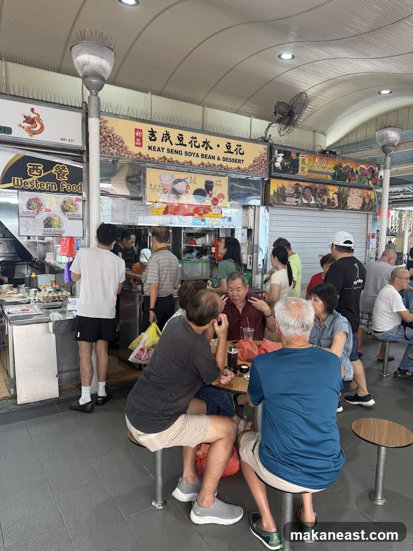 People eating at a food stall