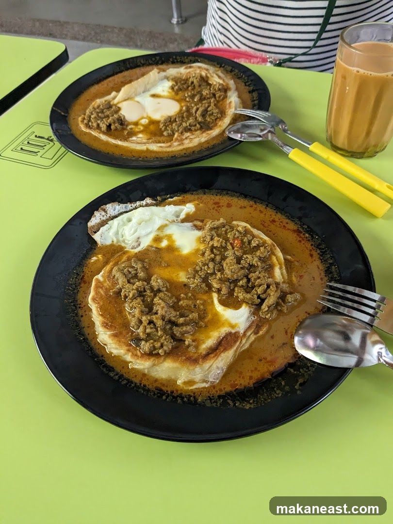 Roti Canai with Curry and Egg