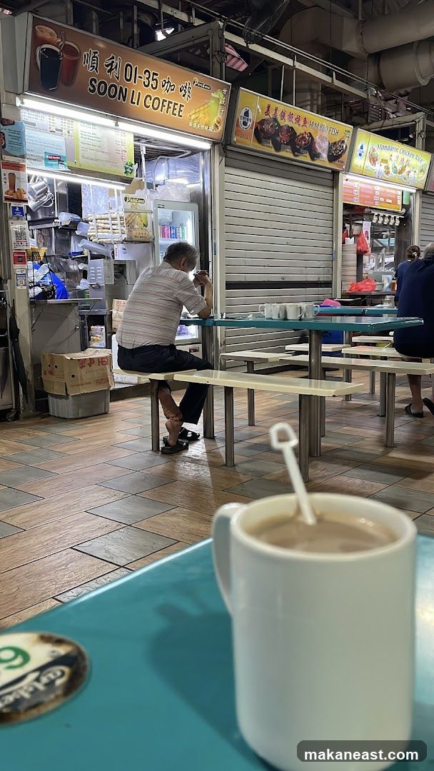 Food Stall with Seated Customer
