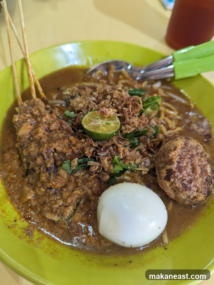 Noodle Dish with Skewers and Egg