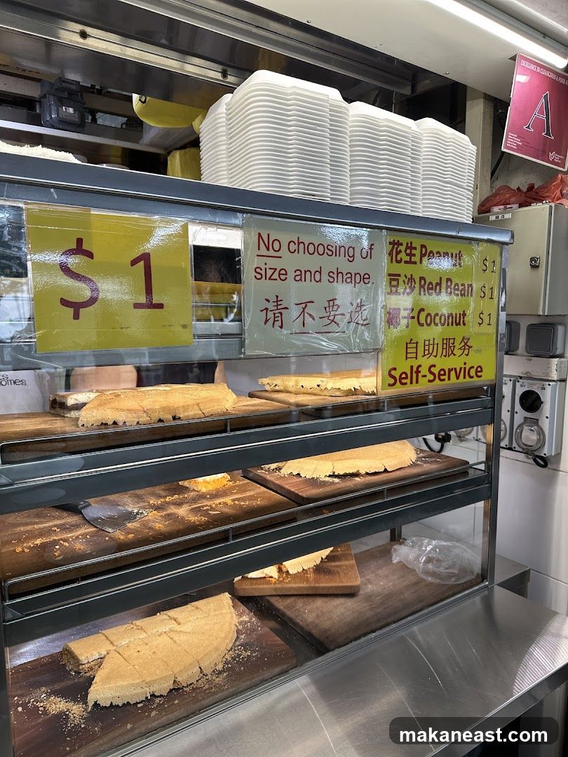 Food stall with cakes and prices