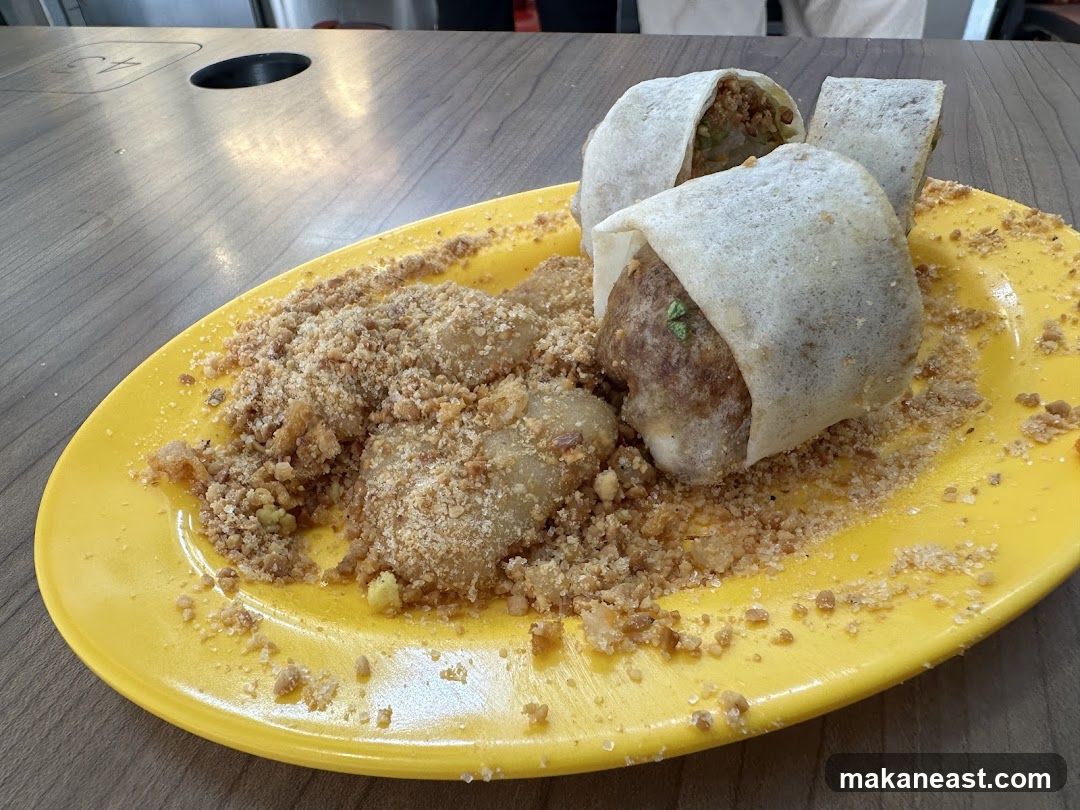Spring Rolls and Mochi on a Yellow Plate