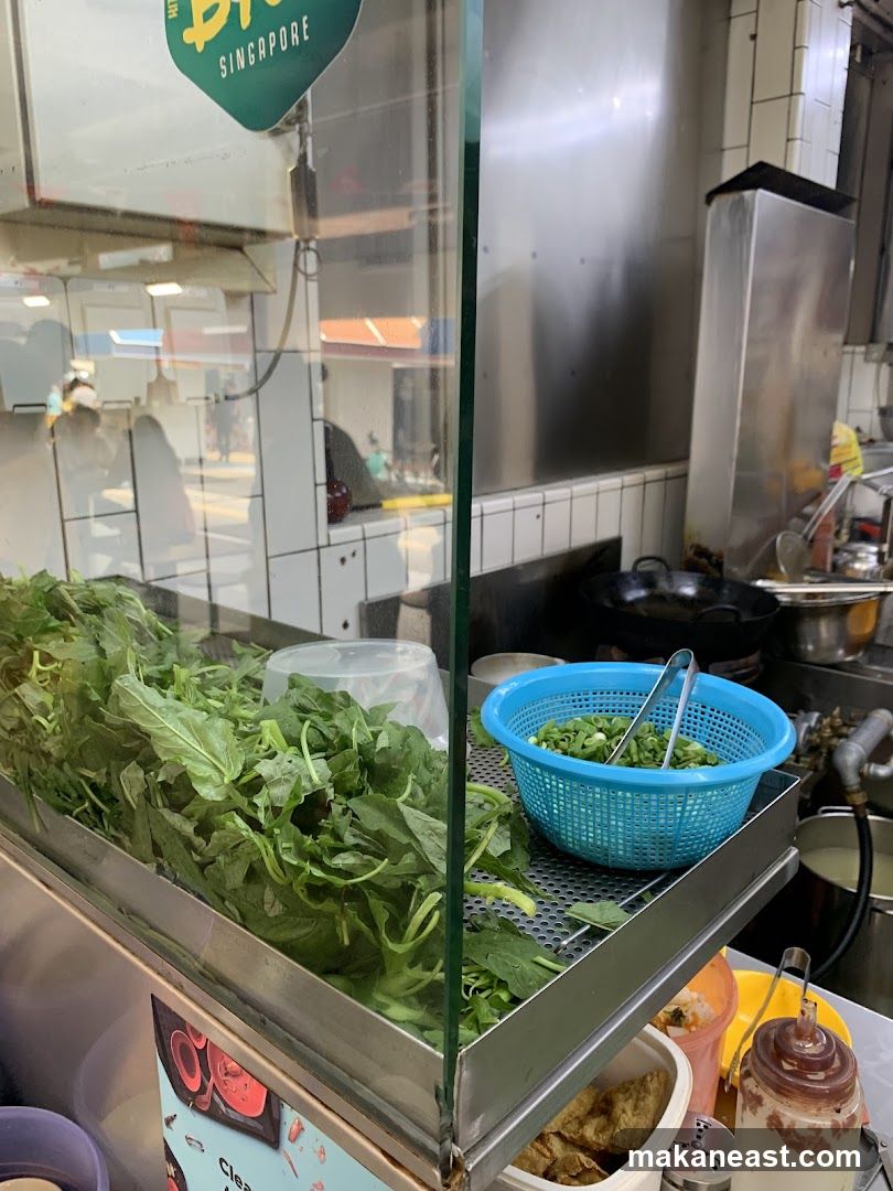 Fresh Greens and Ingredients at a Food Stall