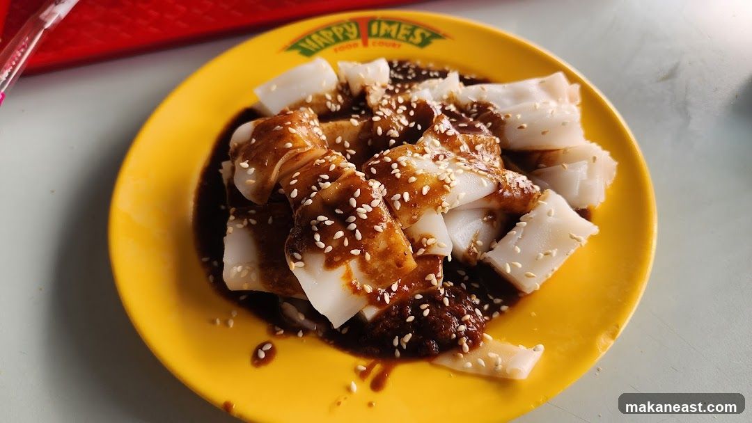 Chee Cheong Fun with Sauce and Sesame Seeds