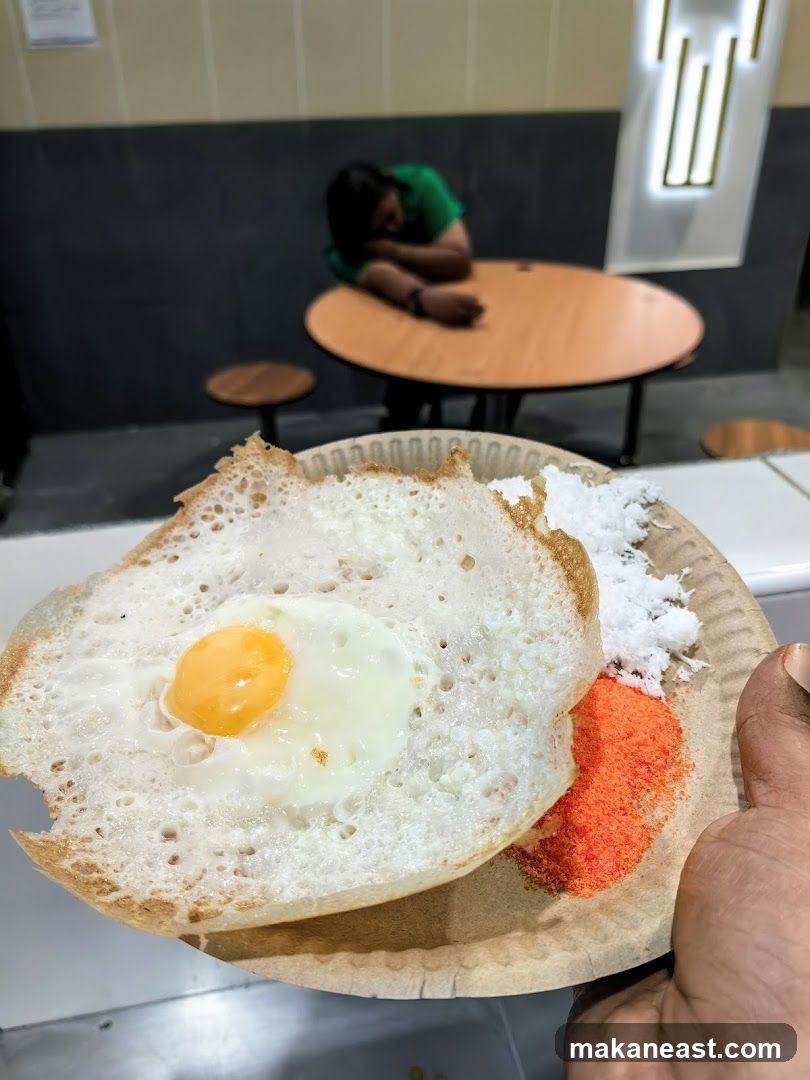 Appam with Egg and Coconut