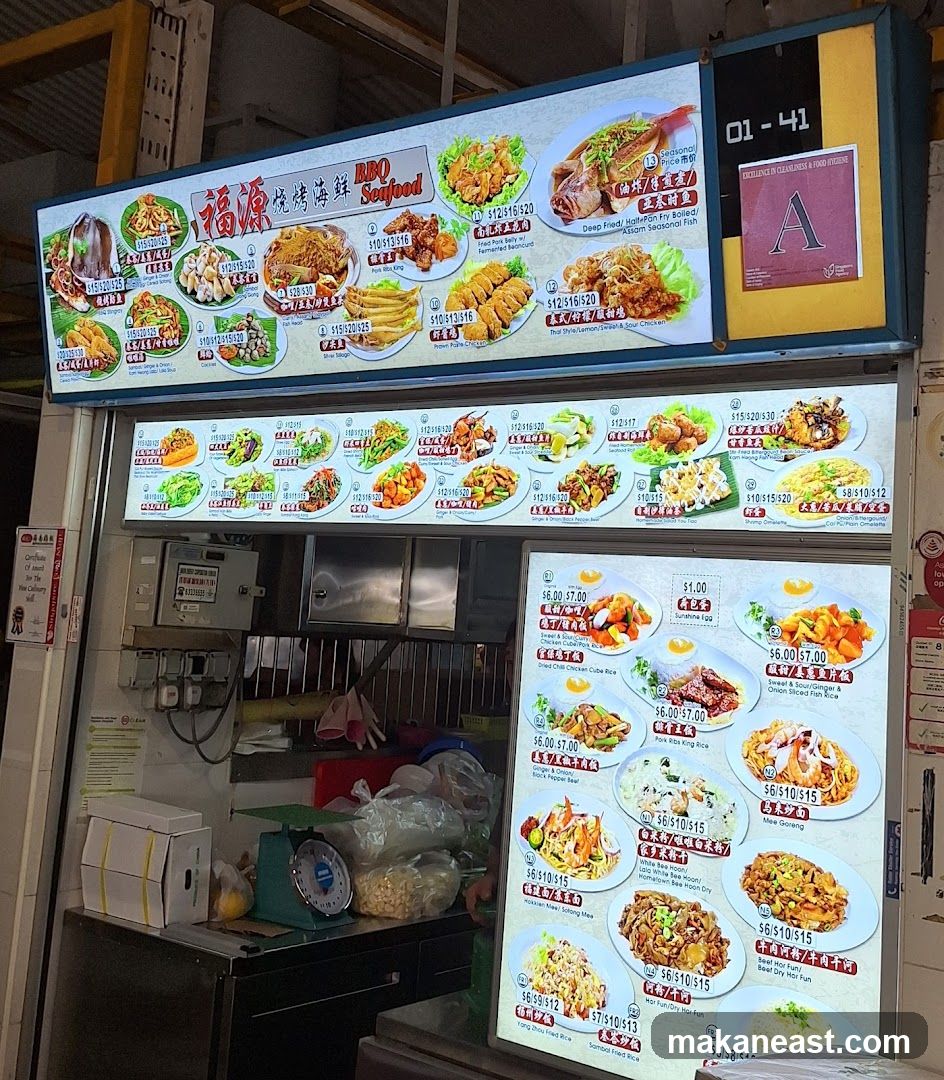 A menu board displaying various seafood and BBQ dishes with prices.