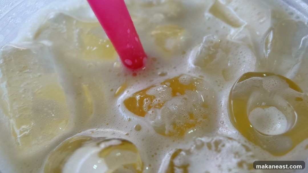 Iced Beverage with Pink Straw