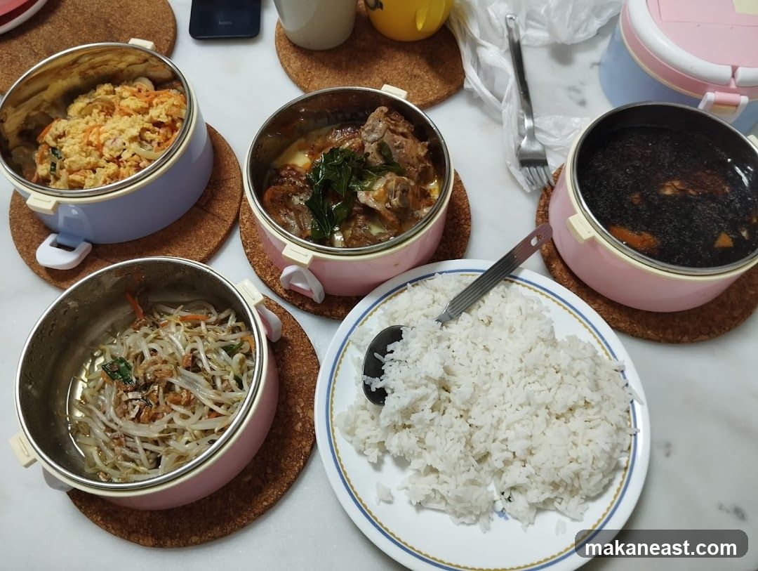 Home-cooked meal with rice and side dishes