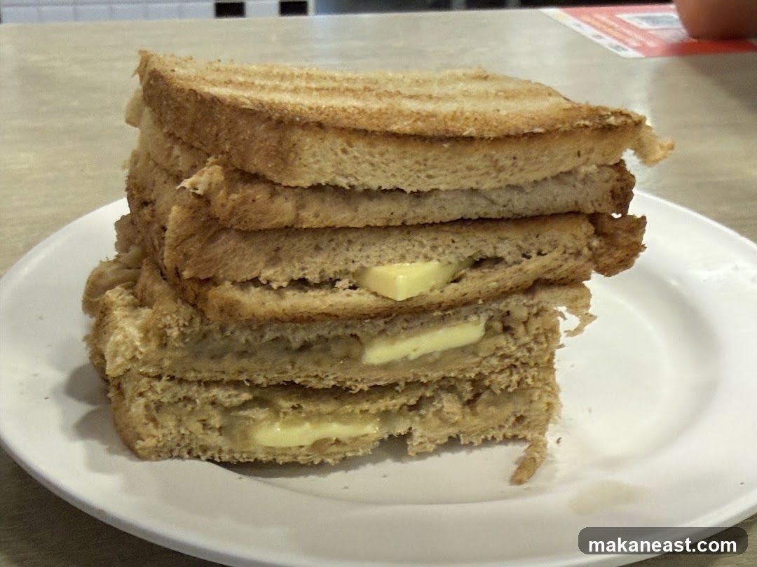 Stack of Buttered Toast