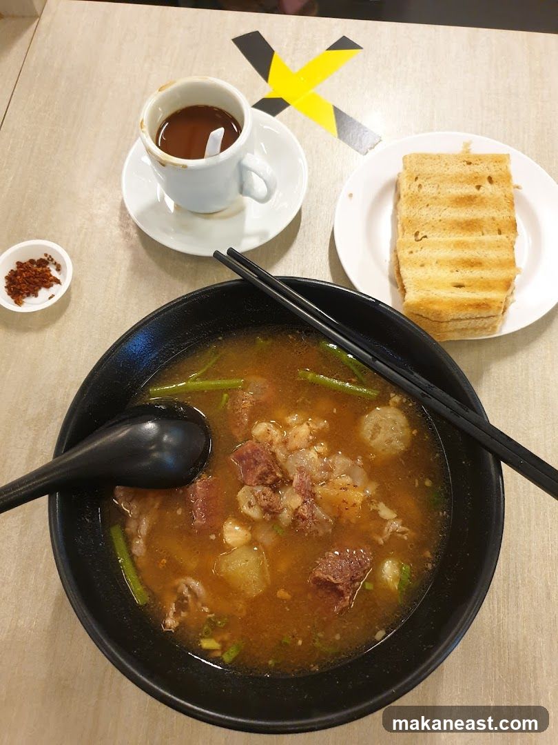 Noodle Soup with Toast and Coffee