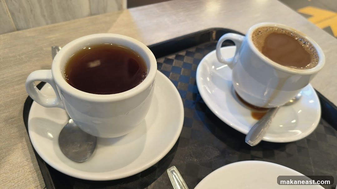 Two cups of coffee and tea