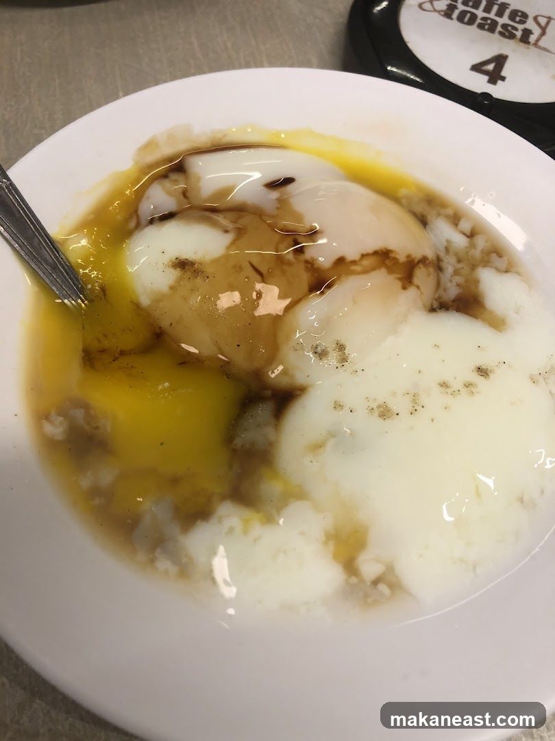 Soft-boiled eggs with soy sauce and pepper